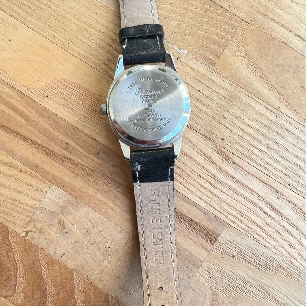 Precision by Gruen ladies silver tone black leather dress watch NEW BATTERY
